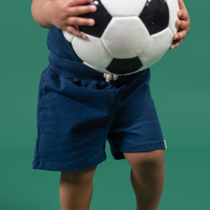 Navy basic shorts with elastic waistband, knee-length pull-on fit