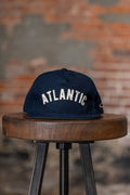 Ampal Creative Atlantic IV - Snapback. on stool front profile