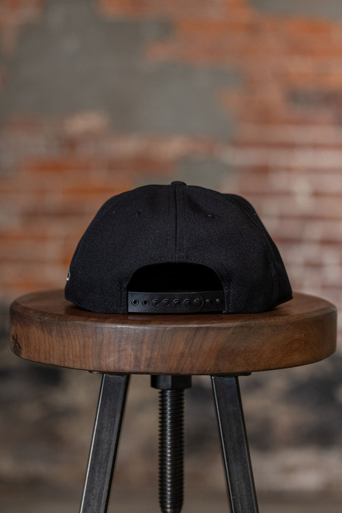 Ampal Creative East - Snapback. on stool back profile