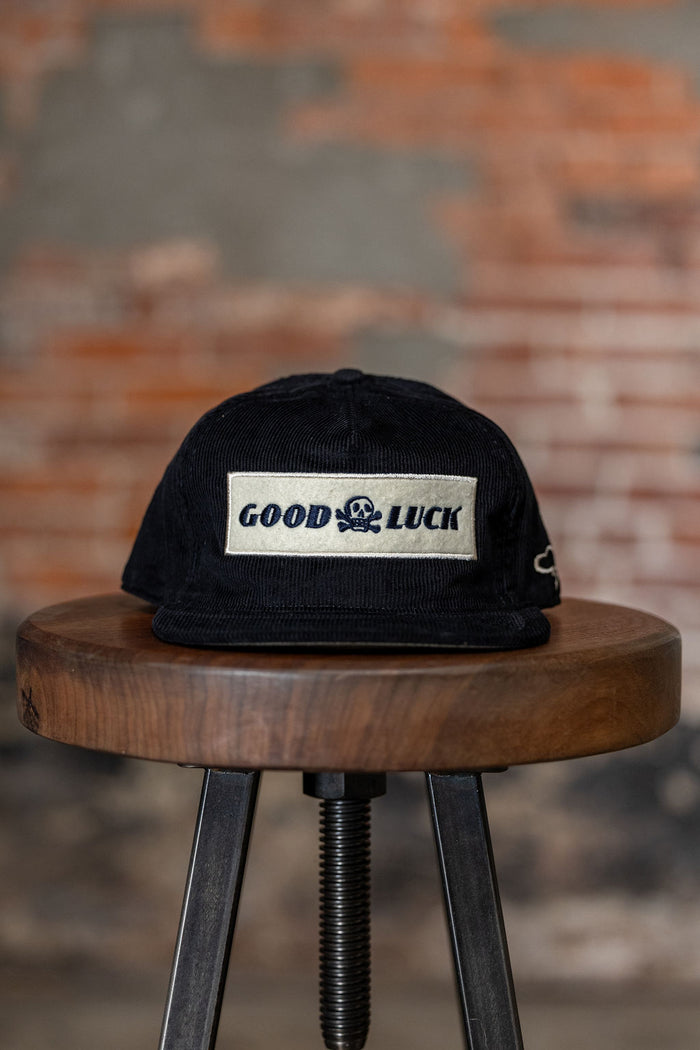 Ampal Creative Good Luck Cord - Snapback. on stool front profile
