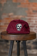 Ampal Creative The Skull - Merlot Snapback. on stool front profile