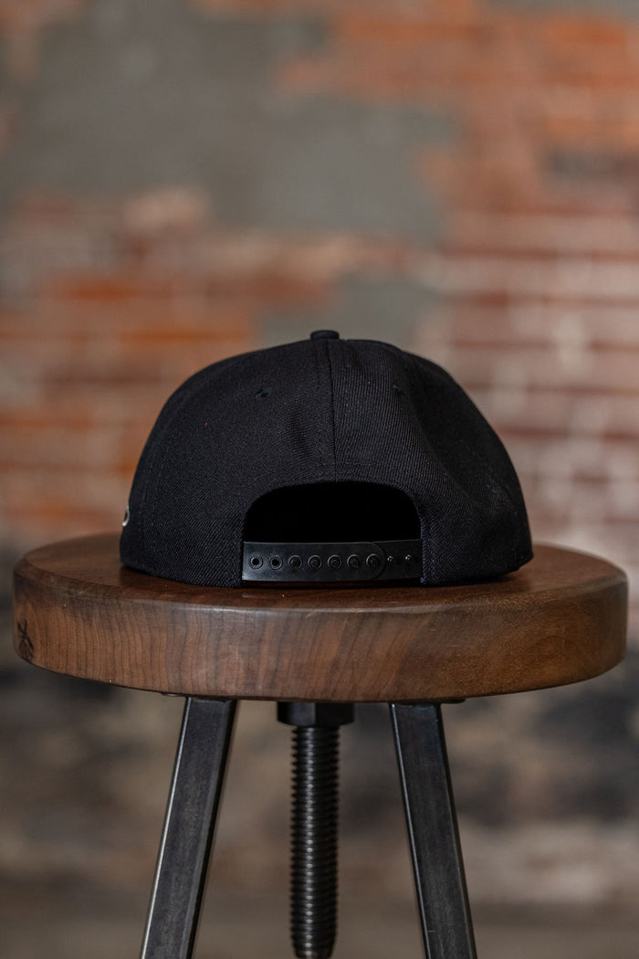 Ampal Creative West - Snapback. on stool back profile