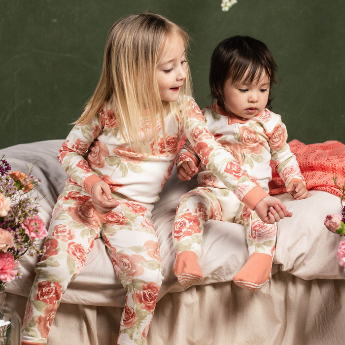 Kids organic cotton floral pajamas in cream with coral rose pattern, long sleeves and pants