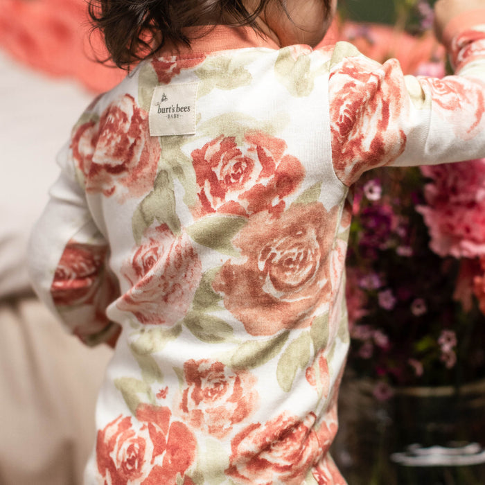 Organic cotton sleeper with pink and coral rose pattern, long sleeves
