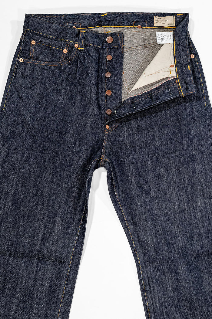 Big John indigo denim jeans wide fit front view with open button fly, laying flat