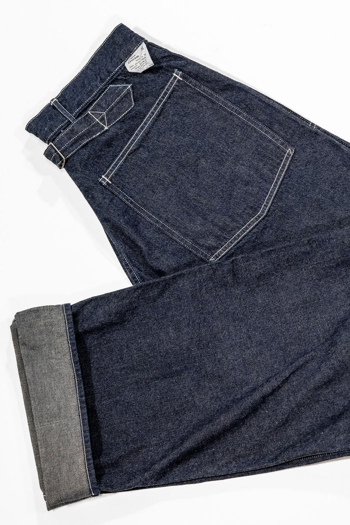 Buzz Rickson's BR41106 Denim Working Trousers - One Wash. laid on side with cuff showing
