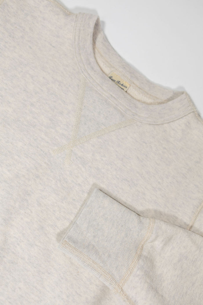 Buzz Rickson's BR65622 Set-in Crew Neck Sweatshirt in Oatmeal - Laying flat, front view close-up with sleeve cuff