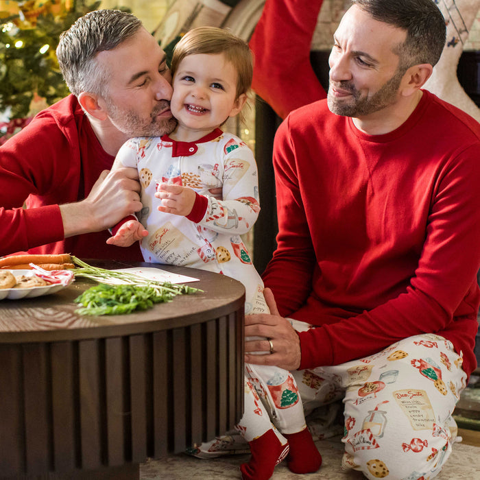 Mens red Christmas PJ set: long-sleeve top and pajama pants with festive print