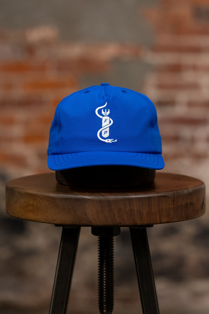 Franklin & Poe Surf Cap - Nylon Royal Blue on stool, facing forward