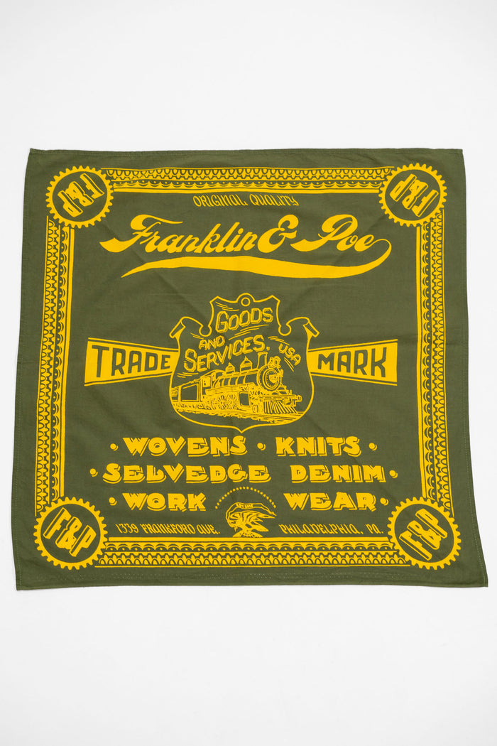 Green bandana with custom yellow design and text