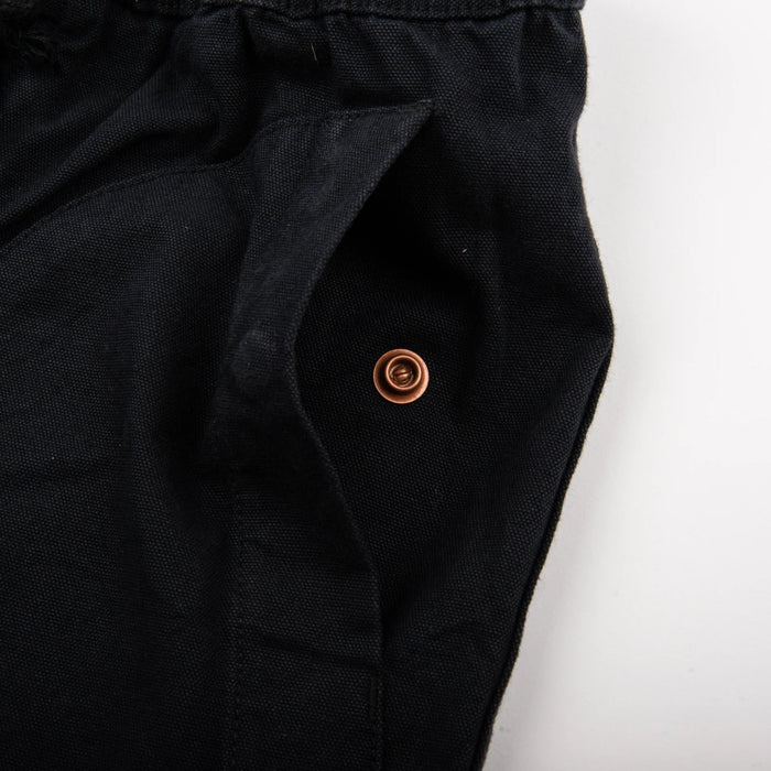 Freenote Cloth Deck Shorts - Black. detail shot of pocket snap