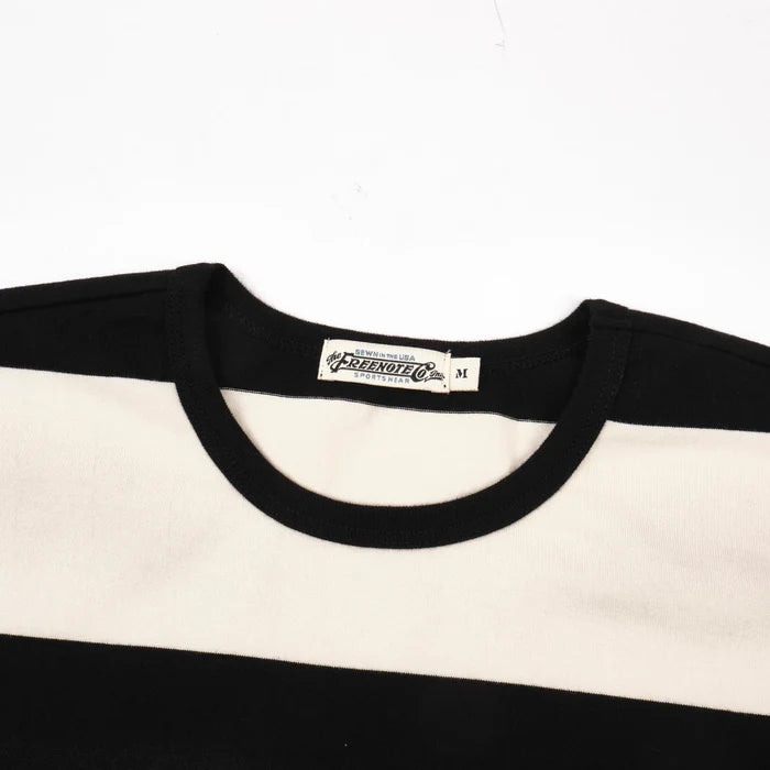 Freenote Cloth Mooch Tee - Black Stripe. close up shot of inside tag