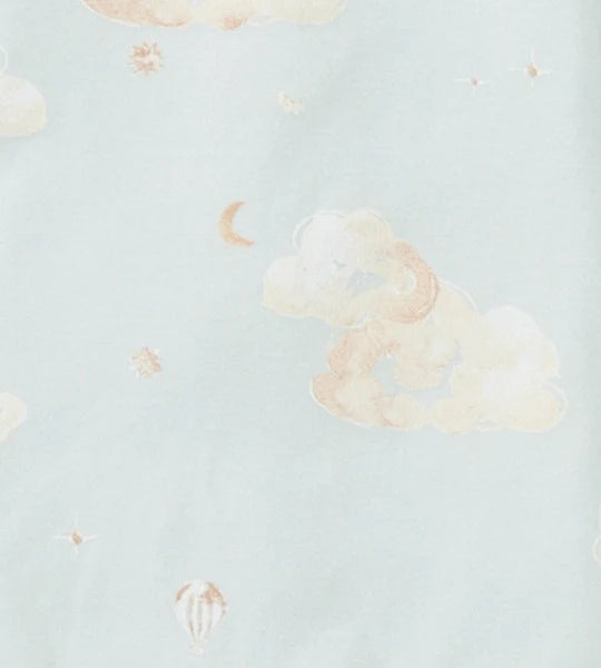 Light blue fabric close-up with pale cloud and small star pattern