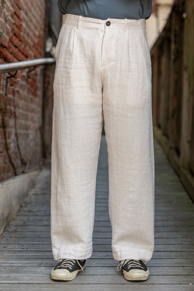 Hansen Garments Bobby Wide Pleated Trousers - Off White Gauze - model shot - waist down - front facing