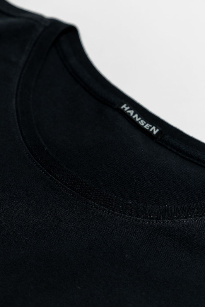 Hansen Garments Julian Crew Neck T-Shirt - Black laid flat. Details on neck stitching.