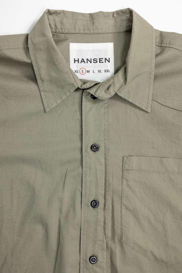 Hansen Garments Reidar Short Sleeve Shirt - Dry Oregano - product shot - front facing - white background - close up of collar, buttons, and brand tag