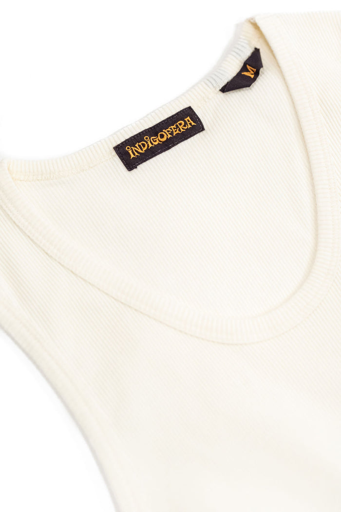 Indigofera Frank Tank Top - Cocatoo White. close up of inside tag