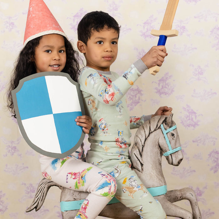 Kids light green pajama set with allover knight and dragon characters, long sleeves