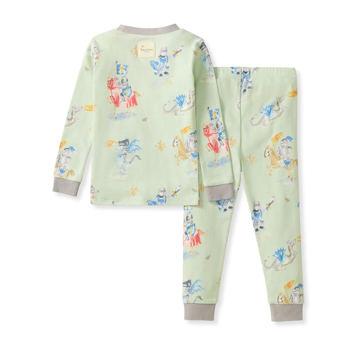 Light green two-piece pajama set with long-sleeve top and cuffed pants, knight/dragon print