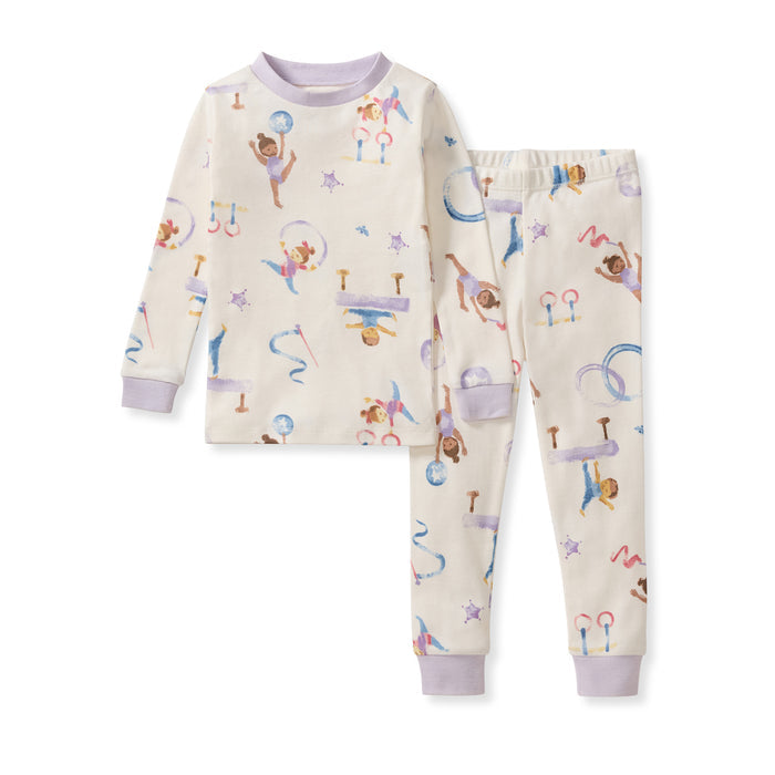 Organic cotton pajama set: cream long-sleeve top and matching pants with gymnastics print