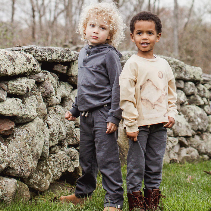 Kids long-sleeve tees with watercolor mountain and moon prints