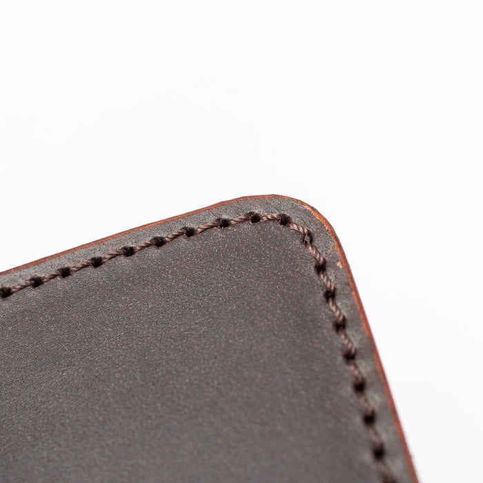 Obbi Good Label Kingsman Metro Flap Style Cardholder - Brown - Close up of brown stitching of wallet against a white background