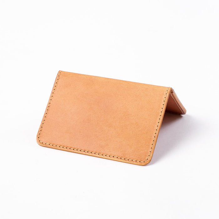 Obbi Good Label Kingsman Metro Flap Style Cardholder - Tan - A tan leather cardholder, displayed open, inside facing down, showcasing smooth external side against a white background