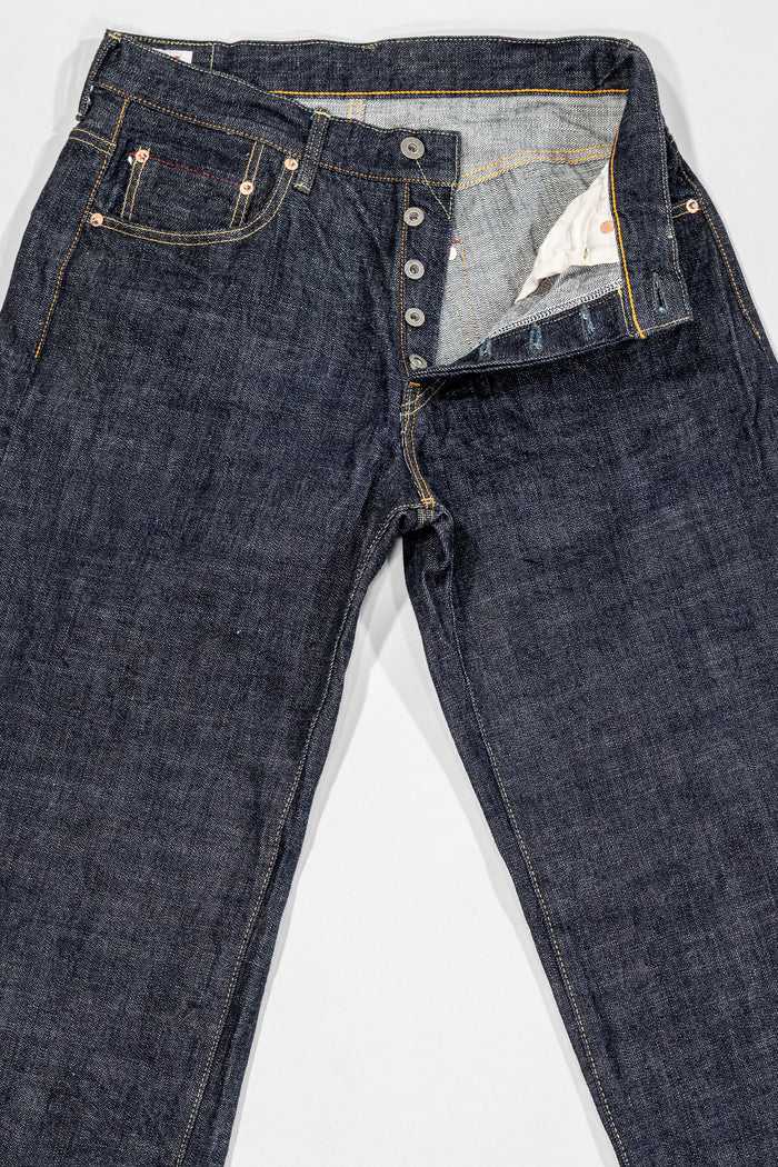 Oni Denim 222-LS - 13.5oz Super Wide Straight "Long Slub". laid on back with button fly undone