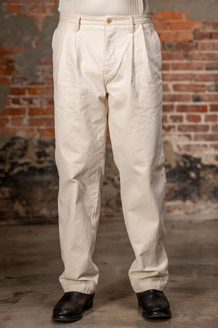 Seuvas 10oz Canvas 2-Tuck Trousers (Long) - Natural. on model front profile
