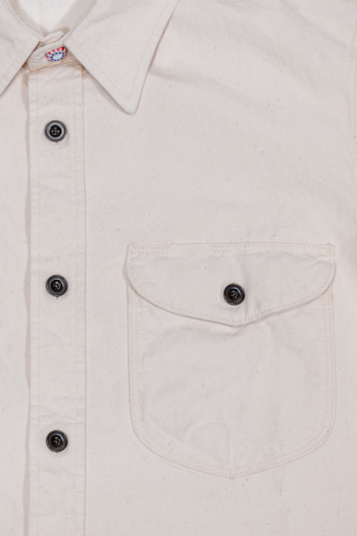 Seuvas 8oz Canvas Flap Work Shirt - Natural. close up detail shot of top pocket