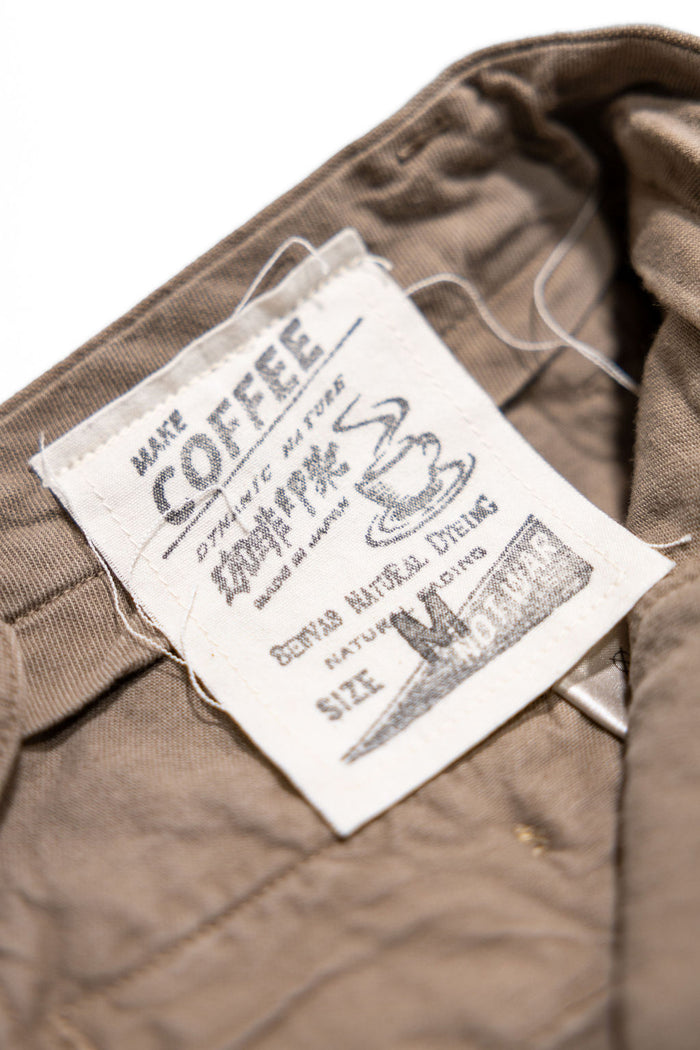 Seuvas Canvas 2-Tuck Shorts - Coffee. close up detail shot of inside tag