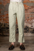 Seuvas Canvas Tapered 2-Tuck Pants (Regular) - Matcha. on model front profile