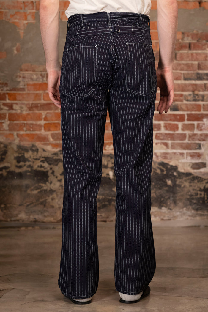 Navy striped fatigue pocket pants with back cinch back view on model