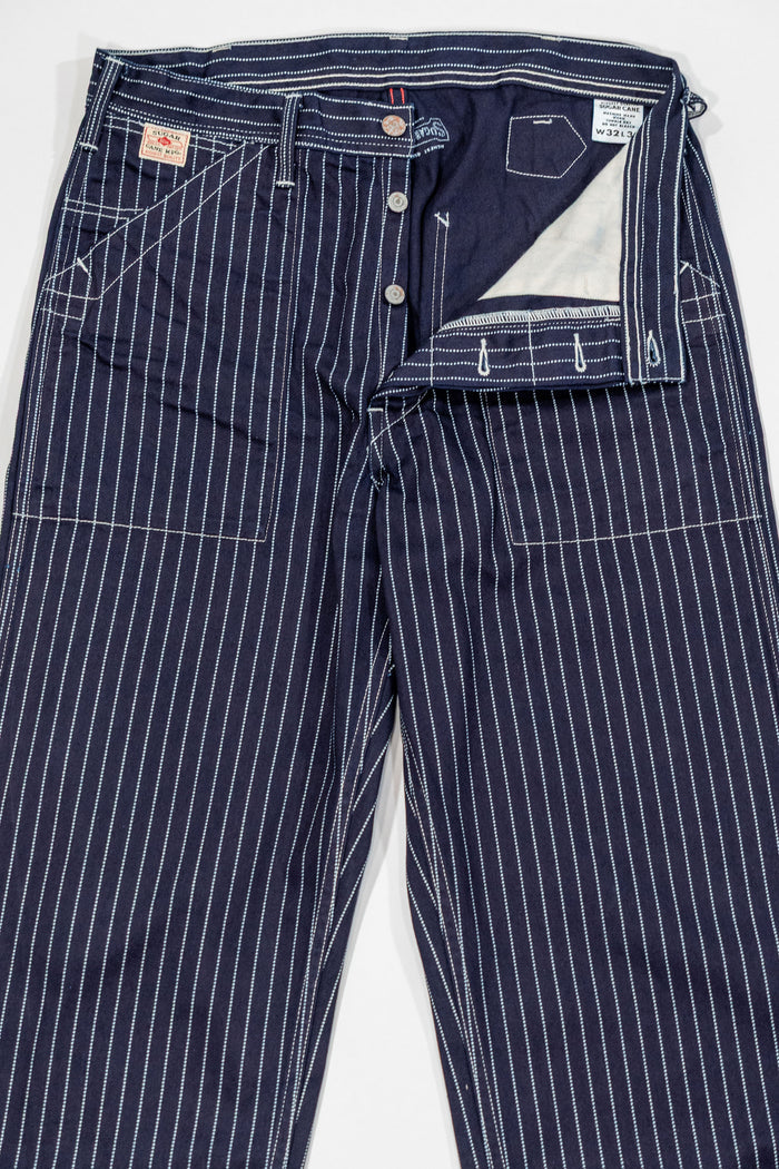Navy striped fatigue pocket pants front view open fly laying flat