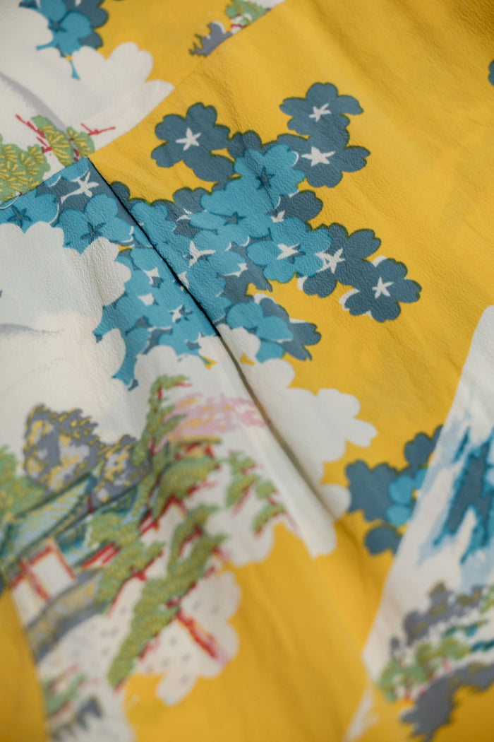 Sun Surf Rayon Hawaiian Shirt “Ancient Capital” - Yellow. close up detail of shirt pattern