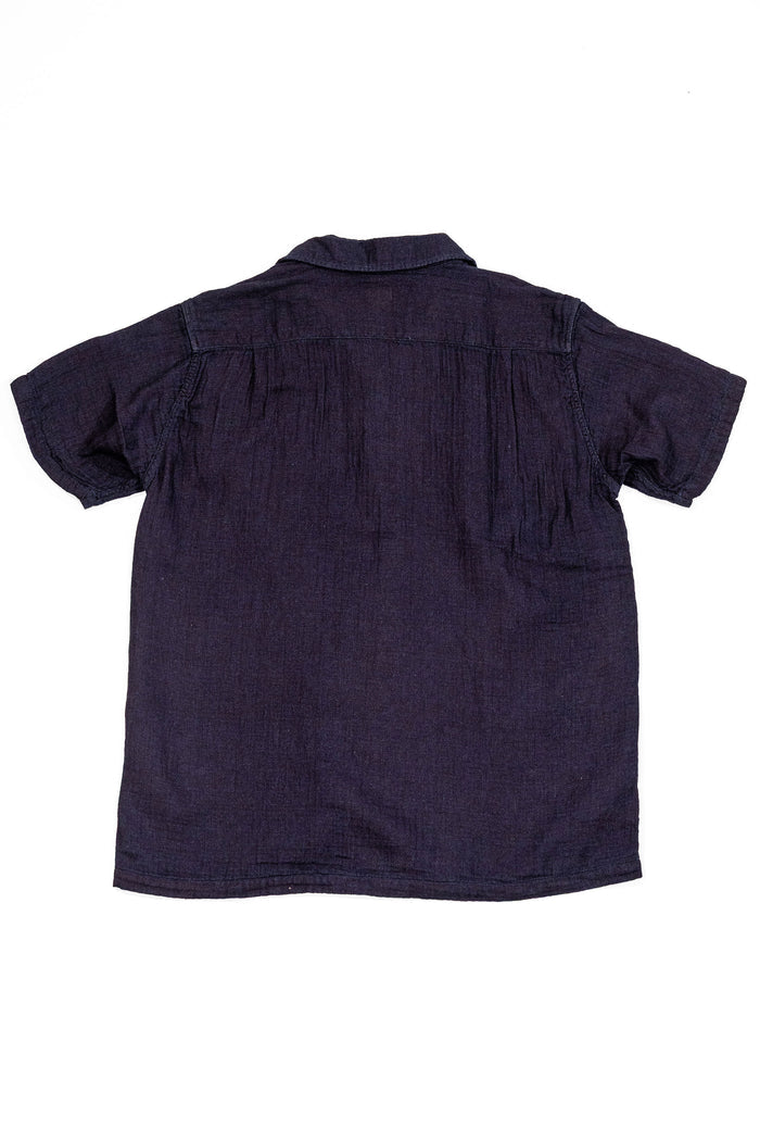 UES Herringbone Double Gauze Short Sleeve Shirt - Indigo: shown from the back on a white background.