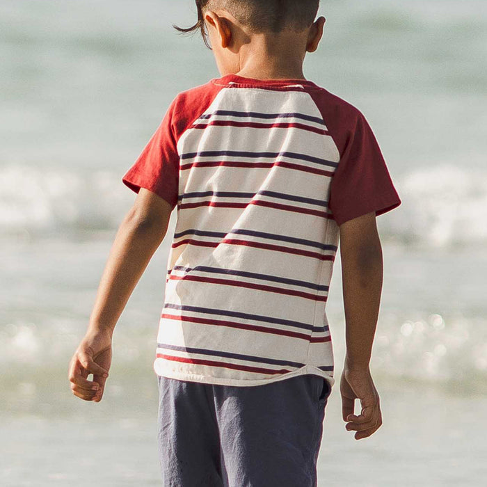 Boys striped raglan tee and navy shorts set, shown from the back