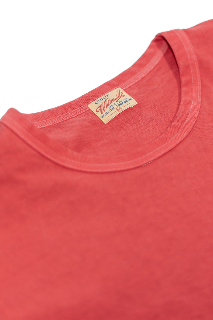Whitesville WV79531 Pigment Dye Pocket T-Shirt - Red - Laid flat close-up of fine ribbed collar and brand tag on a white background