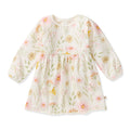 White long-sleeve floral dress with gathered yoke and flared skirt