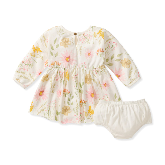 White long-sleeve floral baby dress with gathered waist and matching bloomers